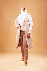 Image showing Fashion, beauty and senior Muslim woman in studio on orange background with stylish, modern and trendy outfit. Creative style, culture and fashion model smile with designer, luxury and cool clothes