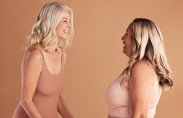 Image showing Beauty, underwear and senior women friends in studio on brown background mockup. Skincare, cosmetics and elderly body positive females with healthy skin, laughing or smiling after antiaging treatment