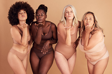 Image showing Women, body and different shape group blowing a kiss in studio for lingerie, beauty and diversity wearing underwear. Portrait of female friends together for body positivity, inclusion and self love