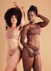 Image showing Body positive, empowerment and black women with body hair for natural beauty, care for skin and confidence on brown studio background. Self love, wellness and African model friends with hairy armpit