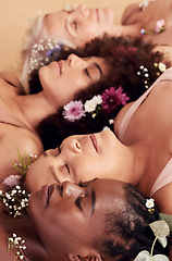 Image showing Sleeping, relax and face of women with flowers for peace, skincare and natural makeup against a studio background. Floral, sleep and diversity with model people, flower crown and calm beauty
