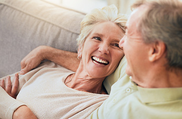 Image showing Love, smile and relax with old couple on sofa for affectionate, bonding and happiness. Retirement, trust and marriage with man and woman in living room of home for support, quality time and peace