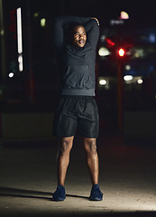 Image showing Black man, outdoor and stretching at night, fitness and exercise for health, body care and balance. African American male, evening or dark in city, workout and training for healthcare, power or relax