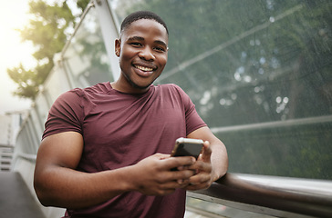 Image showing Smartphone, fitness and black man in portrait for wellness website, blog tips update or social media networking his workout results. Sports runner or athlete man using phone or cellphone in city park