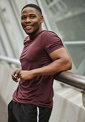 Image showing Face, fitness and black man in city or street preparing for training, workout or exercise. Sports, runner and male from Nigeria outdoors in town thinking about jog, exercising or cardio for wellness.