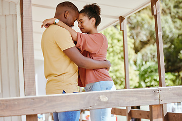 Image showing Hug, love and black couple with care, peace and praying on the porch of their house together in New Zealand. Trust, relax and African man and woman with gratitude, affection and calm at their home