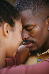 Image showing Love, intimate and black couple hugging on a date for romance, care and intimacy together. Romantic, loving and young African man and woman embracing on a summer honeymoon vacation, holiday or trip.