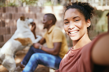 Image showing Black woman, selfie and dog adoption with happiness and love with family outdoor. Puppy, pet and woman portrait in the sunshine happy about bringing animal to its new home in summer with a smile