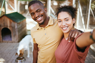 Image showing Love, dog or couple of friends take a selfie at an animal shelter or adoption center for homeless dogs. Pets, face portrait or black woman with a fun black man taking pictures as a happy black couple