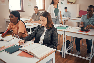 Image showing Classroom, students group and study in diversity school for education, learning and knowledge of books, writing and thinking. Focus, scholarship and youth in college with teacher notes for exam test