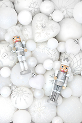 Image showing Christmas White Bauble Decorations and Nutcracker Background