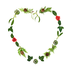 Image showing Christmas Heart Shape Wreath and Traditional Winter Greenery