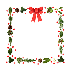 Image showing Christmas Greenery Red Bow and Winter Holly Berry  