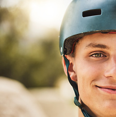 Image showing Closeup portrait, cycling helmet and smile for man at mountain bike park, competition or contest. Happy cyclist, face zoom and safety for bicycle race, extreme sports and focus on vision for winning