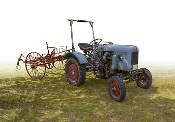 Image showing historic tractor with agricultural device