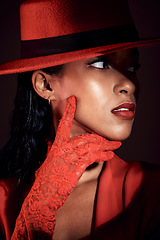 Image showing Black woman, fashion and show performance of a model with red lace glove for designer brand. Creative, unique clothes and fashion model wearing retro, vintage power suit and cool aesthetic of girl