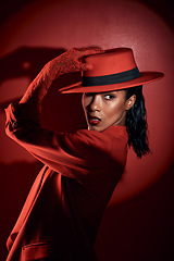 Image showing Fashion, spotlight and model with red suit, luxury clothes or designer brand apparel for aesthetic 90s style on studio background. Mystery, dark beauty or retro black woman with creative shadow light