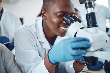 Image showing Science, microscope and students learning in class, classroom physics and happy with research in a lab. Innovation, scientist and African teenager in high school studying microbiology for education