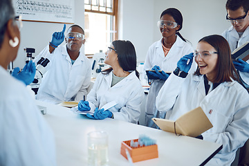 Image showing College, science and education with students in laboratory classroom for medicine, learning and research. Question, analysis and help with people and professor for university, study and healthcare
