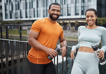 Image showing Friends, fitness and workout portrait at bridge for water drink break in city of Chicago, USA. Wellness, exercise and black people on running rest together with hydration, happiness and smile.