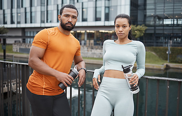 Image showing Portrait, fitness or black couple in city for workout, relax after workout or with water bottle for drinking. Partner, wellness or black woman and man for sports, training or running break in Canada
