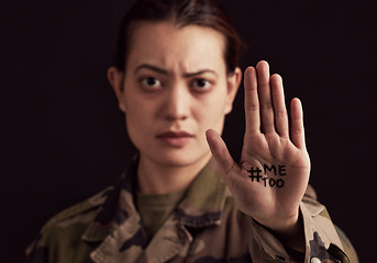 Image showing Military woman, hand and hashtag me too against abuse or rape on black studio background. Face portrait, victim and army female from Ukraine standing against sexual abuse, violence or harassment.