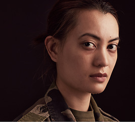 Image showing Face, sad woman and crying army soldier with mental health problem, depression and military trauma of psychology on black background. Portrait of depressed Ukraine war veteran with ptsd from service