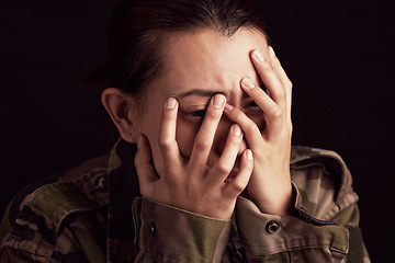 Image showing Military woman, mental health and crying in studio for depressed, anxiety and stress in war clothes. Female soldier, sad ptsd or trauma memory from army by black background with depression in Ukraine