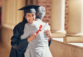 Image showing Portrait, student and hug for graduation, success or higher education. Graduate, female and embrace for university, degree achievement or certificate with happiness, college diploma and smile in gown