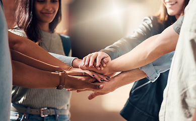 Image showing Diversity, hands together and team support for student collaboration, education motivation and team building project success. Interracial group of collge friends, solidarity and goals mission