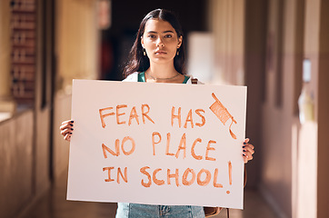 Image showing Woman, protest and poster for gun safety, stop fear in school and students freedom, government law and global justice. Portrait girl, sign and mass shooting problem, politics and support for change