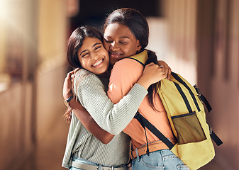 Image showing Education, friends and hug with women in college for learning, scholarship and happiness. Embrace, bonding and affection with girl students on campus for back to school, university and best friends