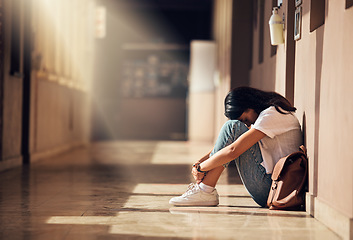 Image showing Stress, anxiety and depression of university girl with mental breakdown on campus floor. Frustrated, thinking and depressed indian woman suffering and overwhelmed with burnout at college.