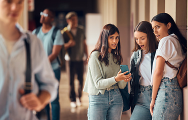 Image showing College friends, phone and gossip or fake news about students on social media, internet and mobile app with teenager group talking. Smartphone bullying post of male and female people at university