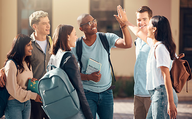 Image showing University, friends and student high five of diversity, college and education group outdoor. Students, study and success support hand gesture of people with happiness excited about learning goal