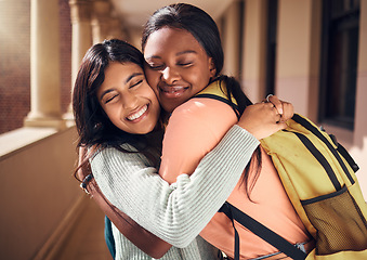 Image showing University, friends and students hug in campus, bonding and care. Love, women and girls from college embrace, cuddle or hugging at school in hallway in support for education, learning and knowledge.