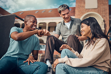Image showing Fist bump, greeting and students at college with diversity, education support and teamwork at school on campus. Excited, goals and friends speaking about scholarship, studying and deal at university