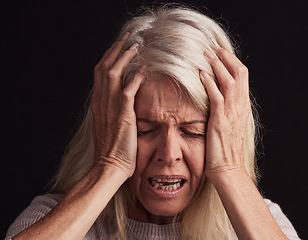 Image showing Mental health, depression and face of senior woman sad over loss, crisis problem and suffer from anxiety stress. Pain, dark fear and crying elderly person depressed over trauma on black background