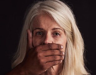 Image showing Woman, portrait and hand on mouth for silence, abuse or violence for danger, depression or fear in studio. Black man, force hands or stress on face for horror, domestic violence or sexual harassment