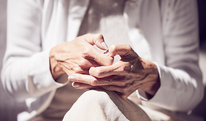 Image showing Anxiety, grief and hands of a senior woman in a therapy session for loss, mental health and support. Hope, counseling and elderly lady pensioner in retirement getting help at psychology rehab center.