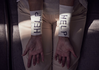 Image showing Help, suicide and arm bandage on woman with depression, mental health or anxiety. Top view, closeup and wrist cover of self harm, injury and helping depressed patient stop psychology crisis of trauma