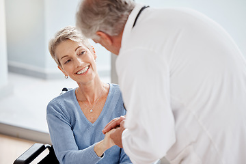 Image showing Senior woman, wheelchair and doctor holding hands in hospital support, surgery trust or wellness life insurance. Smile, happy and disability retirement elderly, healthcare worker or mobility security