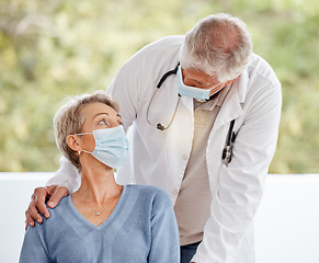 Image showing Covid mask, elderly doctor and woman patient in a medical consultation in a hospital office. Healthcare, nurse and senior wellness consulting employee with support and care for health and insurance
