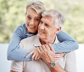 Image showing Elderly, couple and love, hug and relax at family home, commitment with trust, partnership and marriage with happiness. Mature, man and woman with support and hands touch, solidarity and relationship