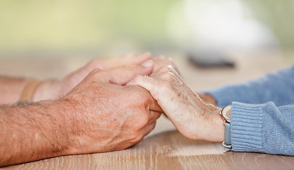 Image showing Senior couple holding hands for love, support and trust in retirement, counseling and marriage. Closeup elderly old people, hand holding and hope, empathy or respect, kindness and gratitude with care