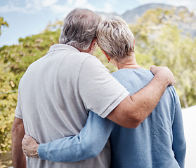 Image showing Love, back and senior couple hug outdoor, bonding and cuddle. Romance, retirement and support of elderly man and woman hugging, embrace with affection and enjoying quality time together on holiday.