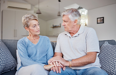 Image showing Elderly couple, holding hands and living room of people with support from sad news at home. Senior, retirement and elderly care kindness showing trust, love and marriage care in a family house