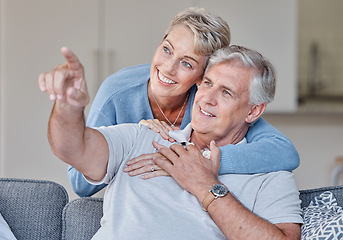 Image showing Senior couple, bonding or hand pointing on sofa in Australia house or home living room in future planning or life insurance strategy. Smile, happy man or retirement elderly woman with showing gesture