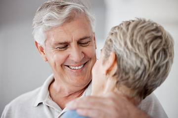 Image showing Senior couple, retirement and man hug woman at home for love, care and support together. Face of elderly partner, happy marriage and old couple relax in family home, apartment and pensioner lifestyle