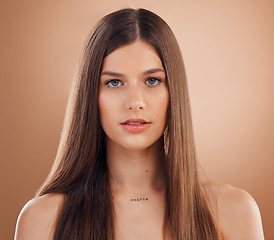 Image showing Hair care, beauty and face of aesthetic woman on studio background for cosmetics, makeup and shampoo product for healthy scalp. Portrait Spain female with glow, growth and strong brunette hairstyle